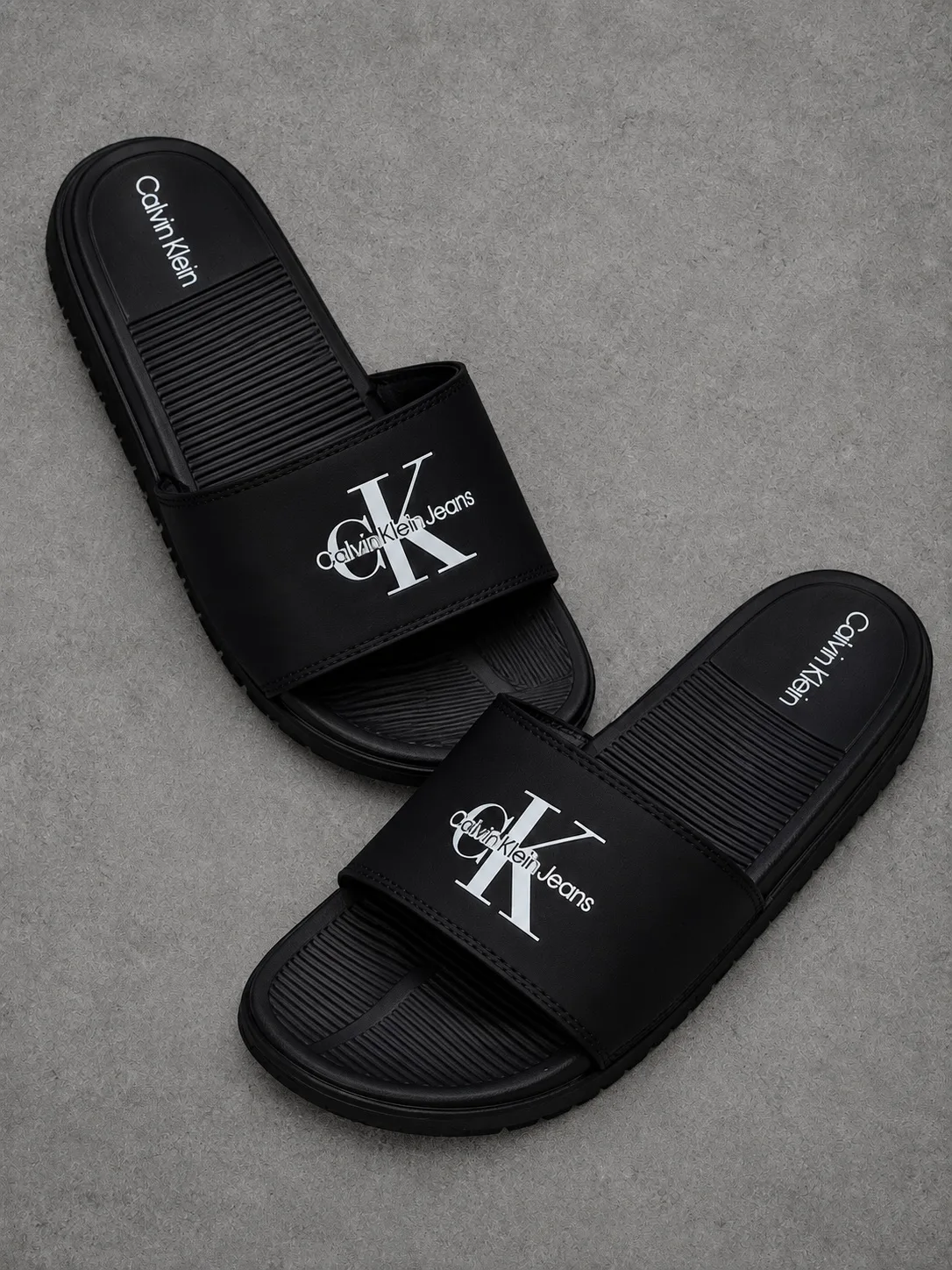 Chanclas calvin klein 1.1 premium negras con blanco